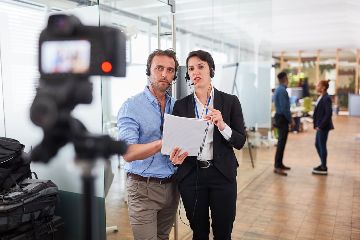 Business People with Headset While Recording Video